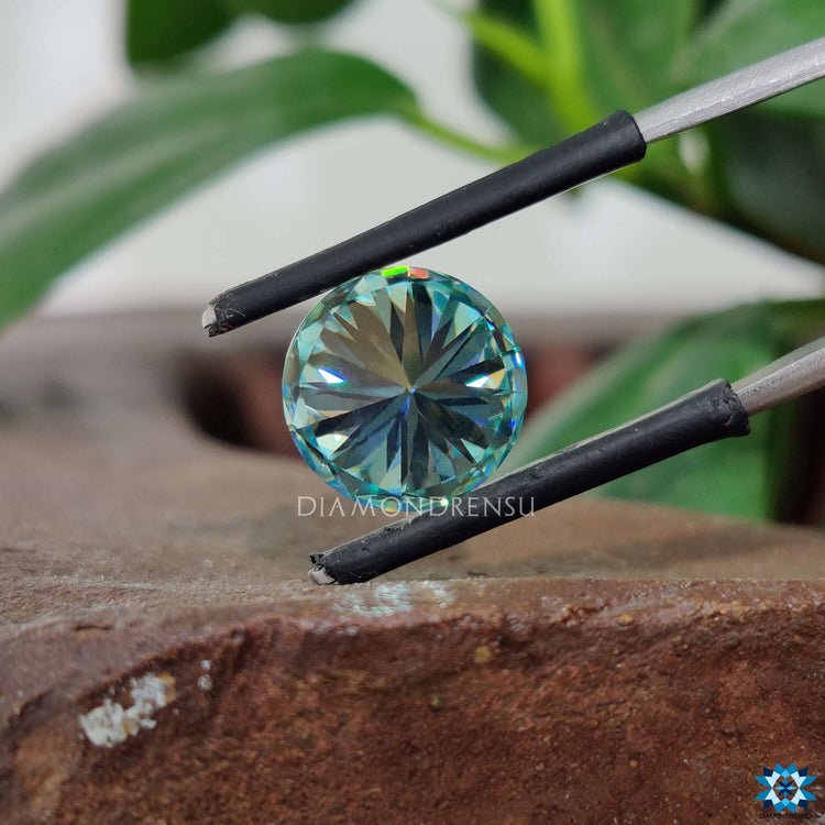 Moissanite loose stone offered in round brilliant cut with 4.81 carat moissanite.
