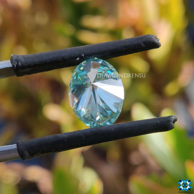 Moissanite oval cut featured in cyan blue moissanite and loose moissanite category.

