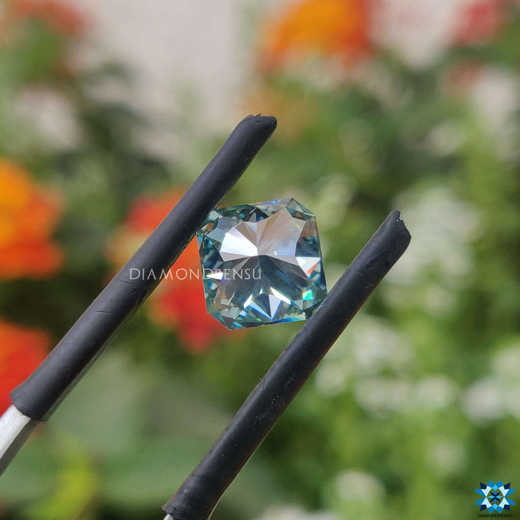 Cyan blue radiant cut listed under 1.65 carat moissanite and buy moissanite stone.
