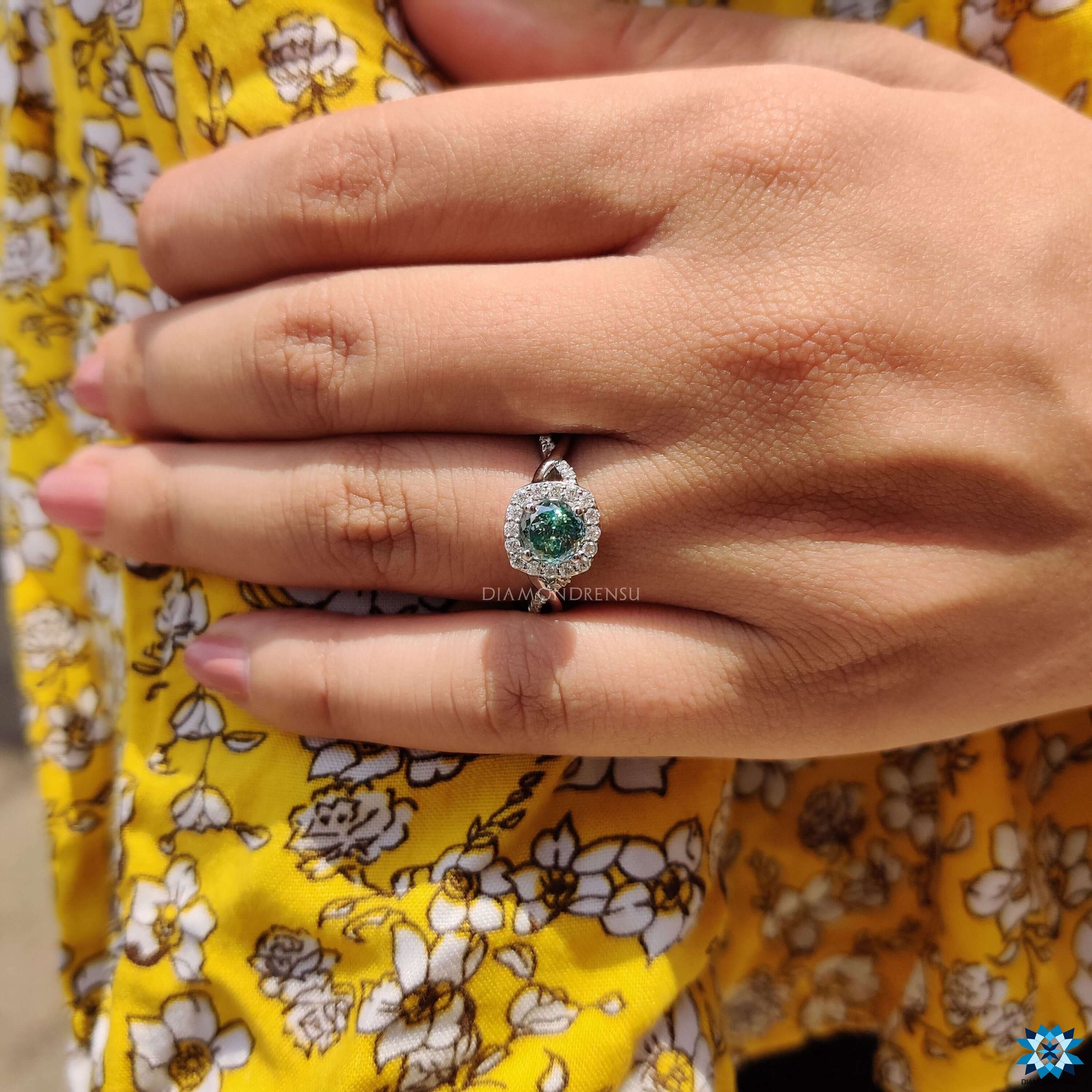 cyan blue moissanite engagement ring
