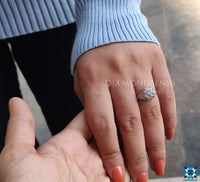 Round solitaire engagement ring set in a refined band, emphasizing its beautiful central stone