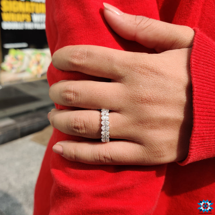 Elegant eternity band oval, arranged perfectly to reflect a continuous circle of love.