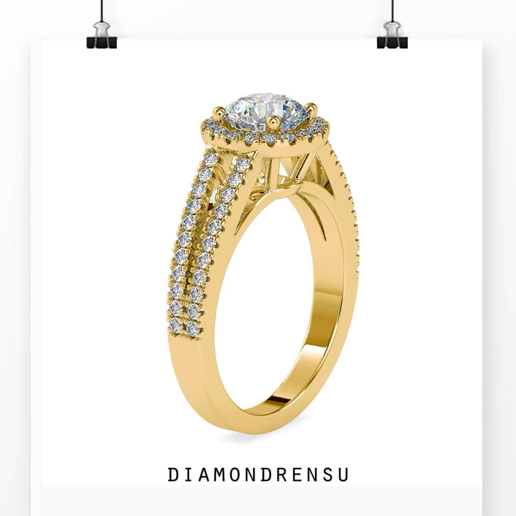 Split shank halo engagement ring with a handmade ring design and a round diamond.
