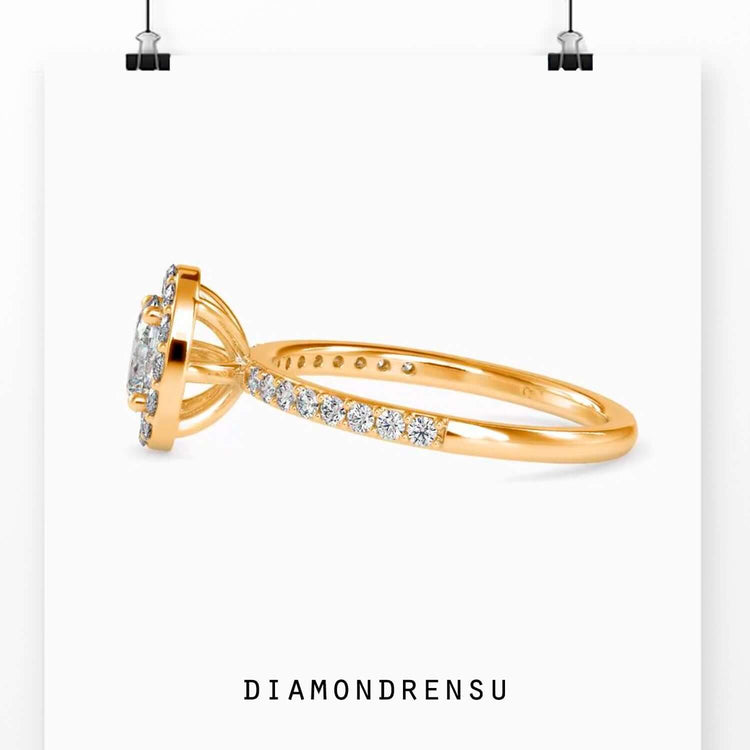 Oval pave engagement ring with a four prong setting and an IGI certified oval diamond.
