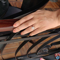 Elegant emerald cut cathedral setting for timeless charm.
