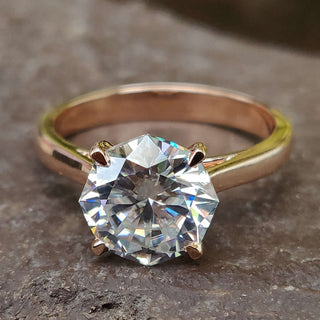 Octagon engagement ring in a stunning rose gold setting for a modern look.
