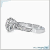 Round cut diamond ring in a classic vintage gold setting.
