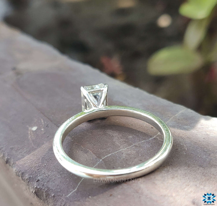 Moissanite engagement rings emerald cut for modern romance.