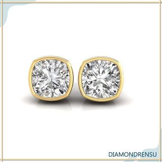 Timeless cushion cut stud earrings, featuring a bezel set stud earrings design.
