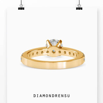 Diamondrensu engagement ring in a gold pave band setting.