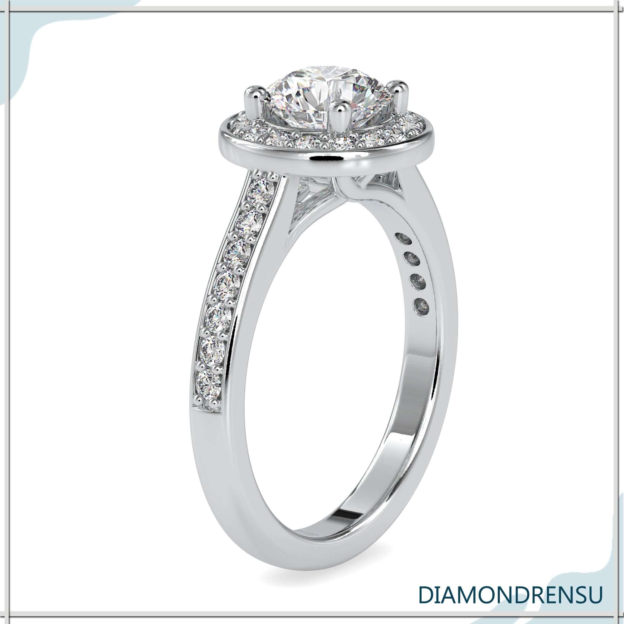 Classic cathedral style ring with a round halo and a 4 prong diamond ring setting.
