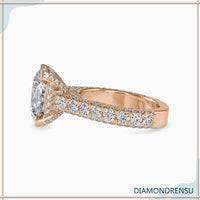 Cathedral style engagement ring with hidden halo ring setting.
