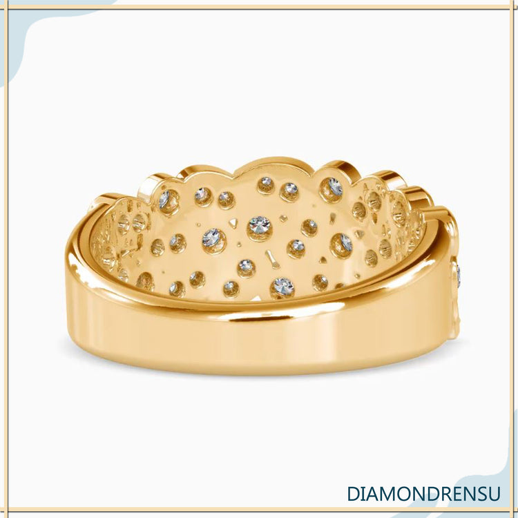 Brilliant diamond cut wedding band with a bezel set diamond for a unique design.
