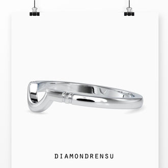 Handmade contour wedding band, crafted with intricate precision
