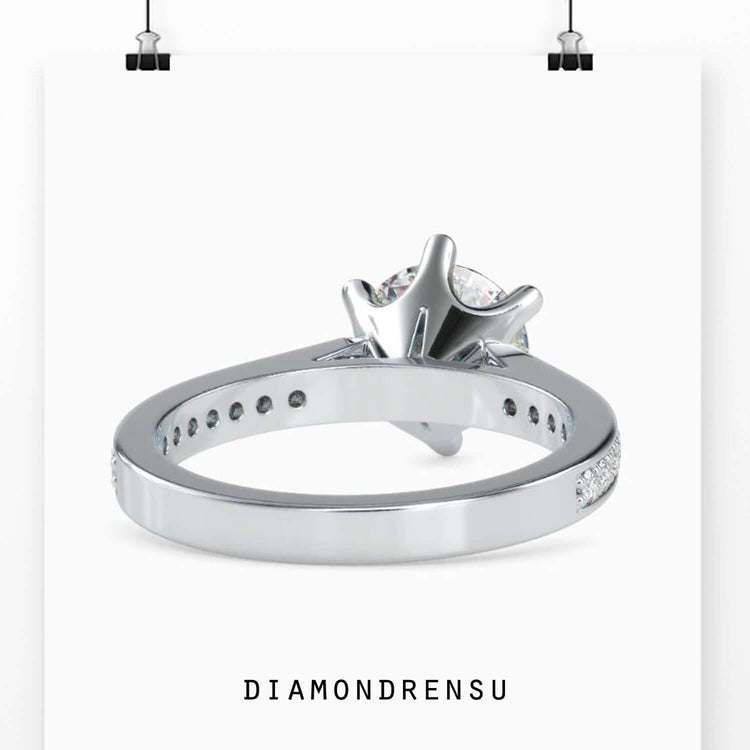 Handmade diamondrensu ring with a rounded diamond in a 6 prong ring setting, perfect for daily wear.