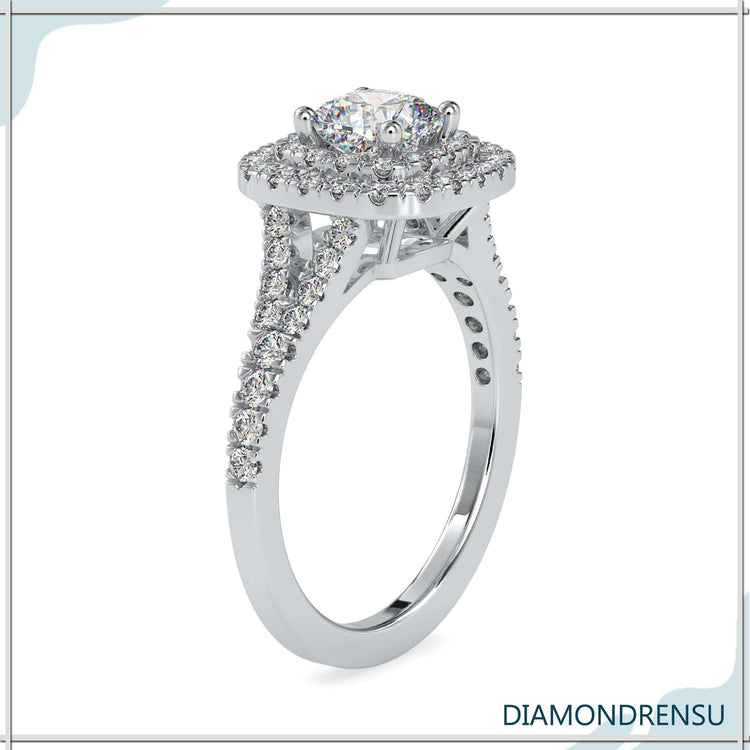 Cushion cut pave engagement ring with a split shank design and handmade jewelry craftsmanship.