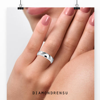 Simple women's wedding band in white gold with a sleek comfort band style.
