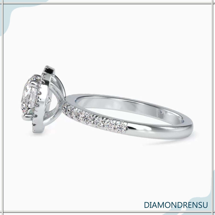 Handmade ring featuring a round ring with a pave diamond setting and IGI certified stones.
