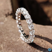 White gold eternity band with a sophisticated and modern finish.