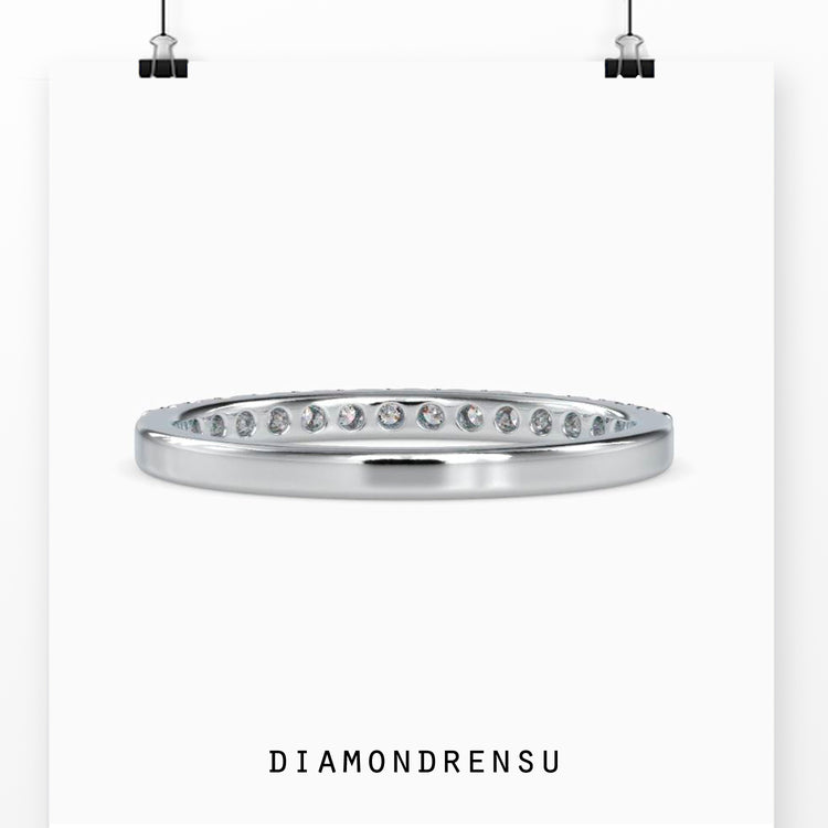Lab Grown Diamond eternity band in white gold, featuring a shared prong design.
