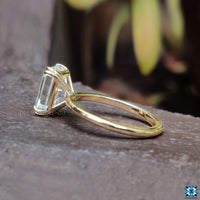 Moissanite engagement ring emerald cut for a sustainable and stunning choice.
